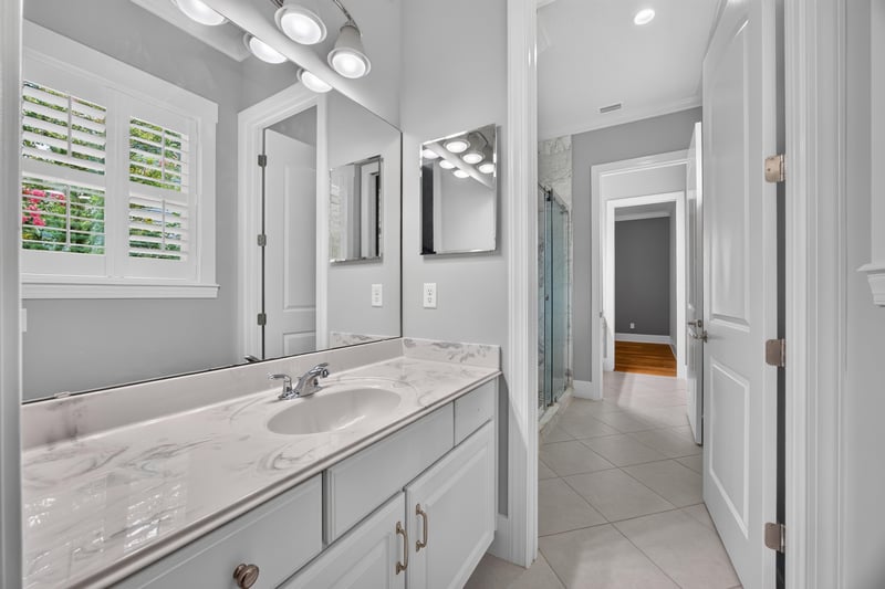 Bathroom vanity and mirror at 186 Freshwater Dr