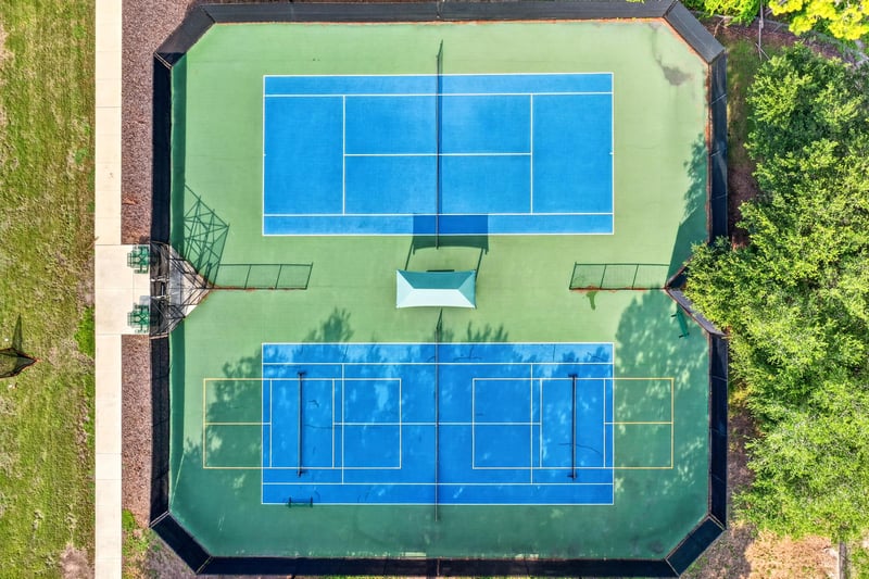 Aerial of community tennis courts in South Hampton