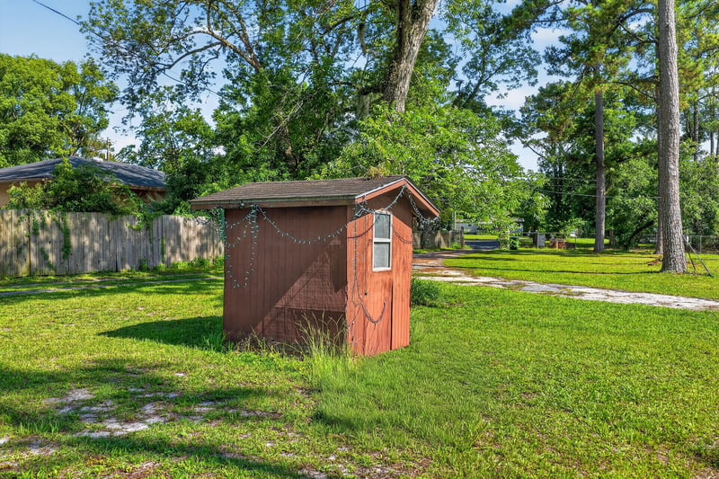 Backyard with small shed at 5745 110th St, Jacksonville, FL 32244
