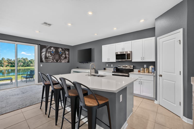 Kitchen dining area with windows overlooking pond at 339 Anthony Dr, Jacksonville, FL