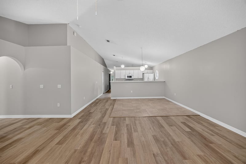 Dining area adjacent to kitchen pass-through at 1845 Saga Ct, Middleburg, FL