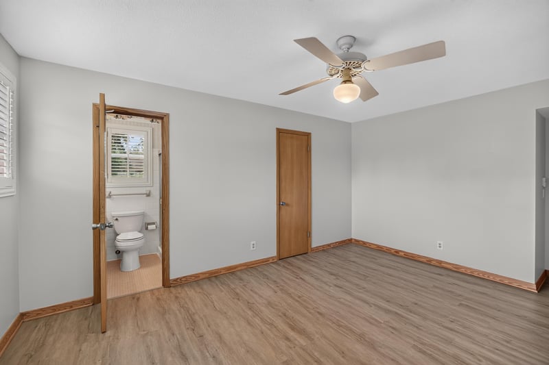 Empty bedroom with ceiling fan and closet doors at 1834 Memory Ln, Jacksonville, FL