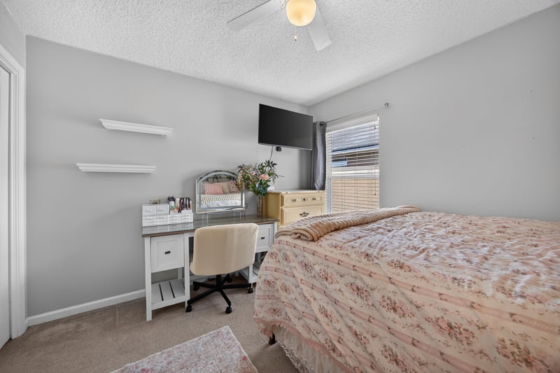 Bedroom set up as a home office with a desk at 3660 Middlebrook Dr, Orange Park, FL 32065