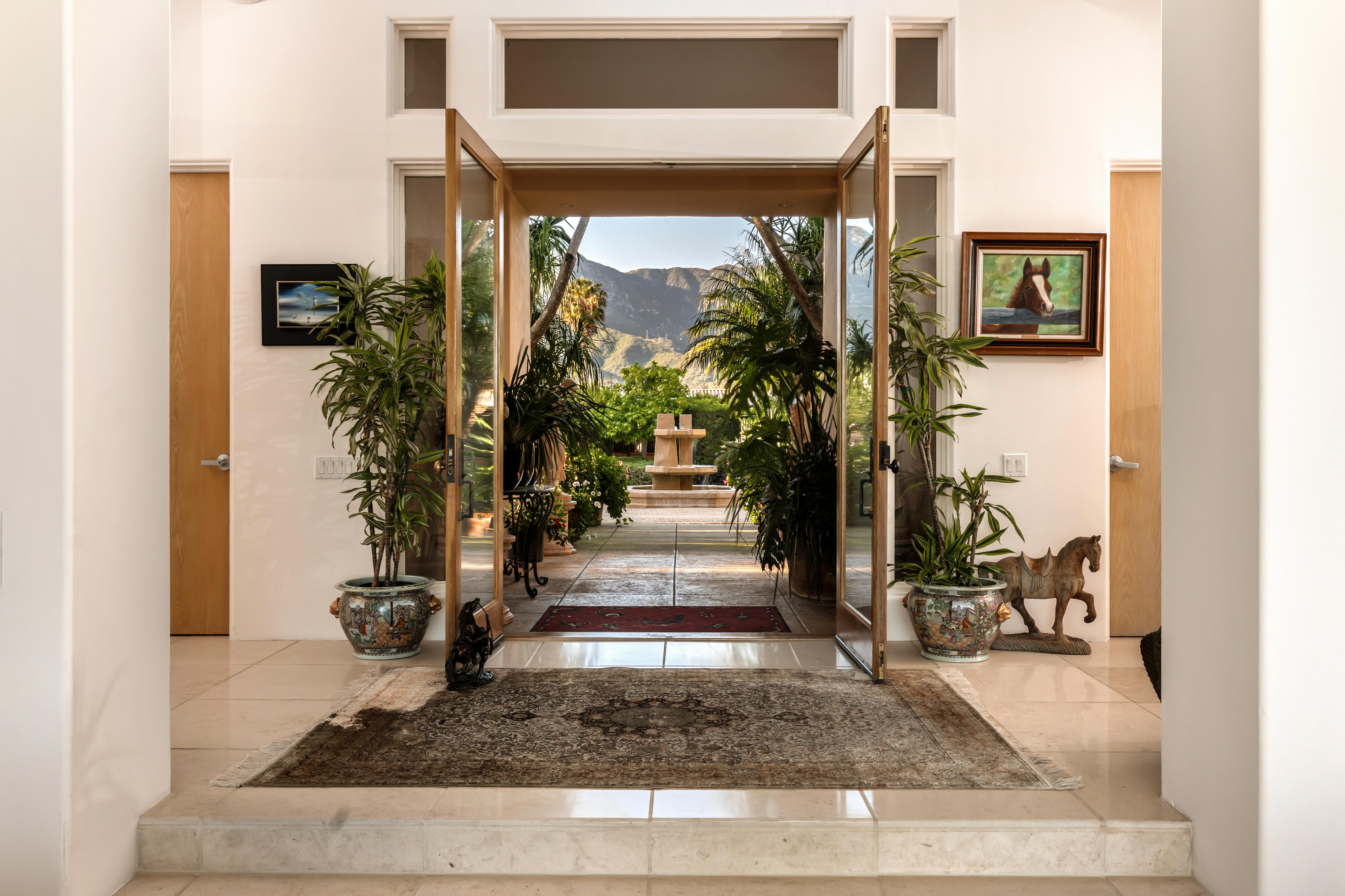 Real estate drone photography of 11 Hunt Drive Santa Barbara with sweeping Santa Ynez Mountain backdrop by VirTour Media