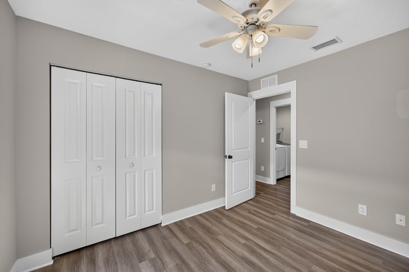 Bedroom with double closet doors at 2855 N 8th St, St. Augustine, FL 32084