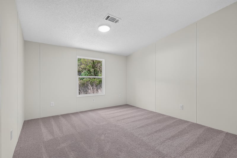 Bedroom with window, unfurnished at 7603 Coach Park Dr, Jacksonville, FL 32244