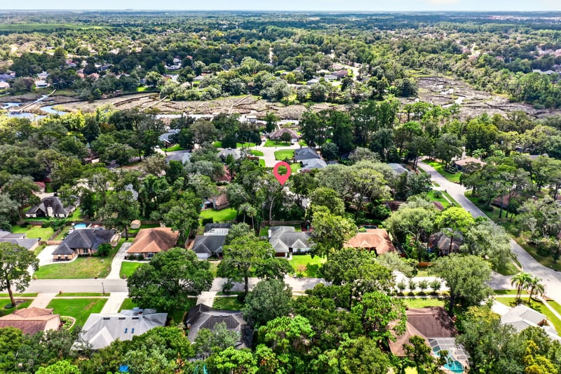 Aerial view of surrounding rooftops and trees in Jacksonville, FL