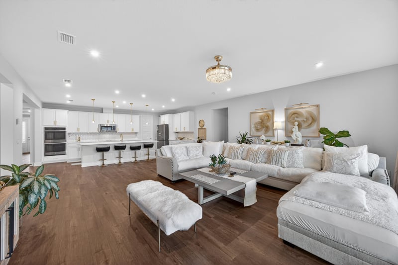Living room with sectional sofa and coffee table at 85491 Fall River Pkwy, Fernandina Beach, FL 32034