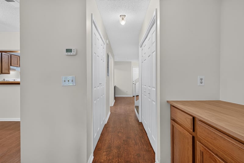 Hallway with multiple interior doors at 4427 Millstone Ct, Jacksonville, FL