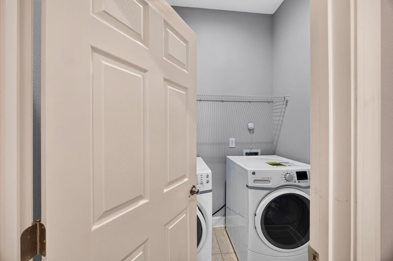 Laundry closet with washer and dryer at 6217 Eclipse Cir, Jacksonville, FL 32258