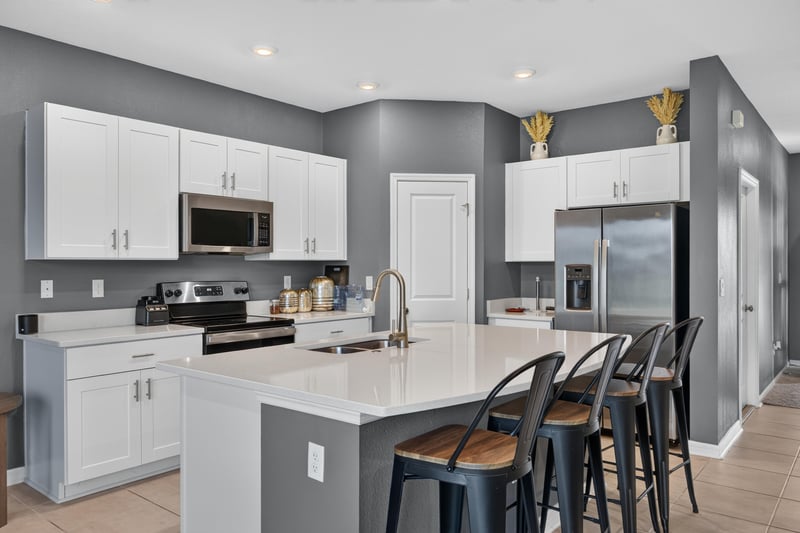 Kitchen with quartz island and stainless range at 339 Anthony Dr, Jacksonville, FL