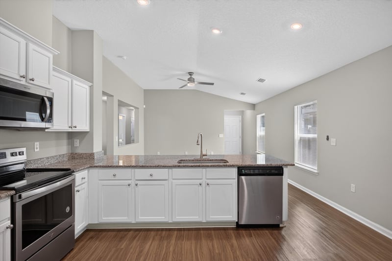 Kitchen counter and cabinets at 7118 Preston Pnes Trl, Jacksonville, FL
