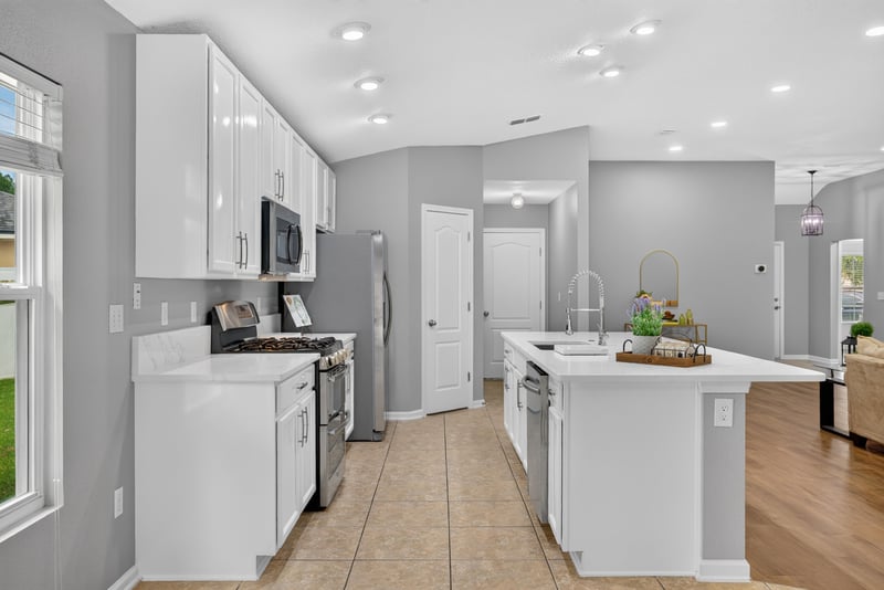 Kitchen sink and cabinets at 706 Grampian Highlands Dr, St. Johns, FL 32259