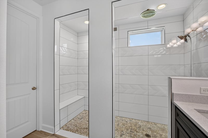 Bathroom walk-in shower with tile surround at 855 Flach Dr, St. Johns, FL