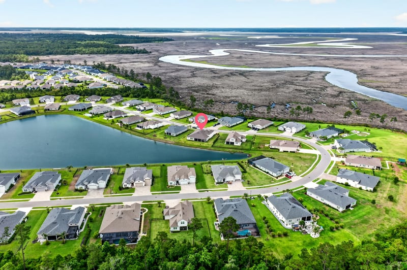 Drone view of marsh and pond near the home in Fernandina Beach, FL