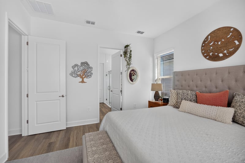 Bedroom with upholstered headboard at 129 Amberwood Dr, St. Augustine, FL