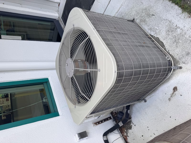Condenser unit with fan cover at 11700 New Kings Rd, Jacksonville, FL 32219