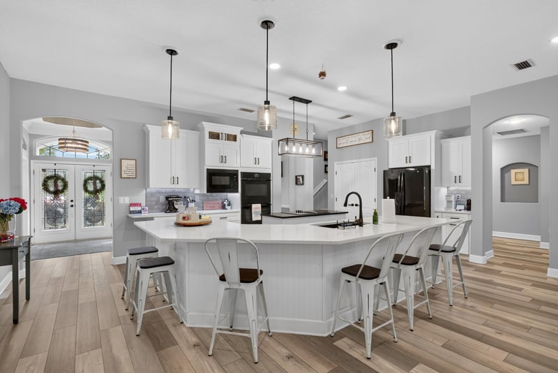 Kitchen with island and double wall ovens at 2304 Spring Hill Ct, Orange Park, FL