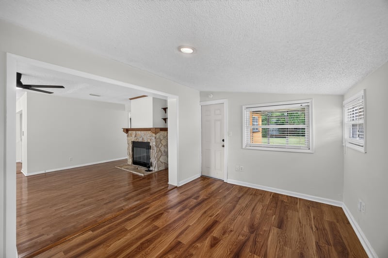 Living room with fireplace and wood floor at 4039 Habana Ave, Jacksonville, FL