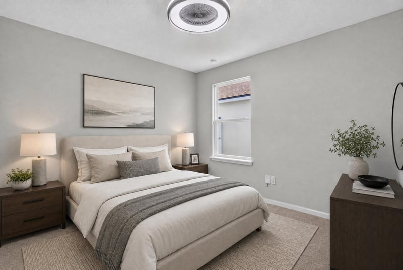 Bedroom with artwork and gray bedding at 10066 Andean Fox Dr, Jacksonville, FL 32222
