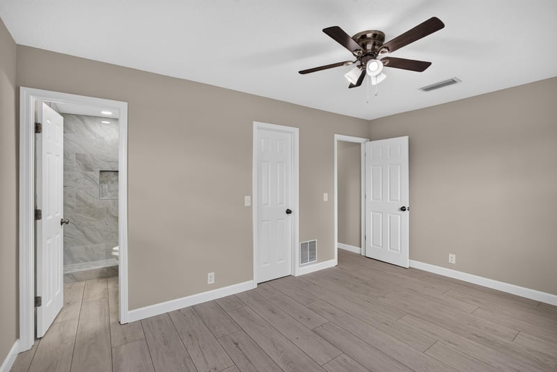 Empty bedroom with double closets at 4117 Wilcrest Ct, Jacksonville, FL 32277