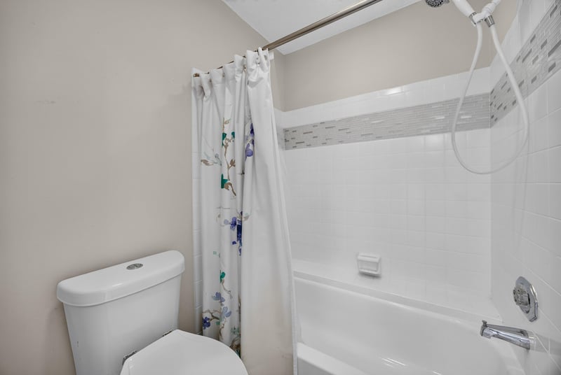Bathtub and shower combination at 3407 Fairbanks Grant Rd N, Jacksonville, FL 32223