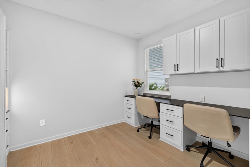 Home office with built-in desks at 93 Lochloosa Ct, St. Johns, FL 32259