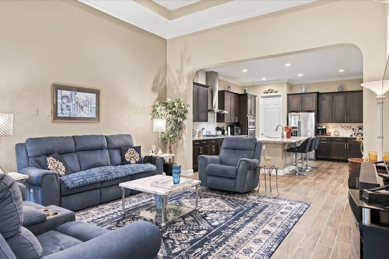 Living room open to kitchen, photographed by Megapixeler on Lucena Ln, Jacksonville, FL