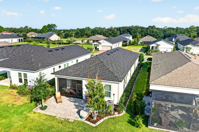 Aerial view of backyard patios along the street in St. Augustine, FL