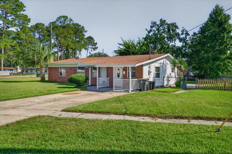 Front exterior with driveway at 5503 Boeing Dr, Jacksonville, FL 32207