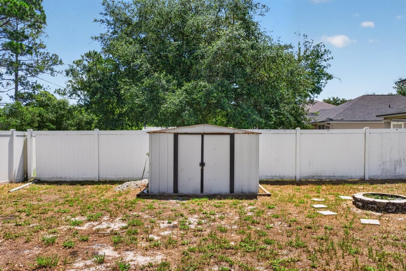 Backyard with storage shed at 224 Pine Arbor Cir, St. Augustine, FL 32084