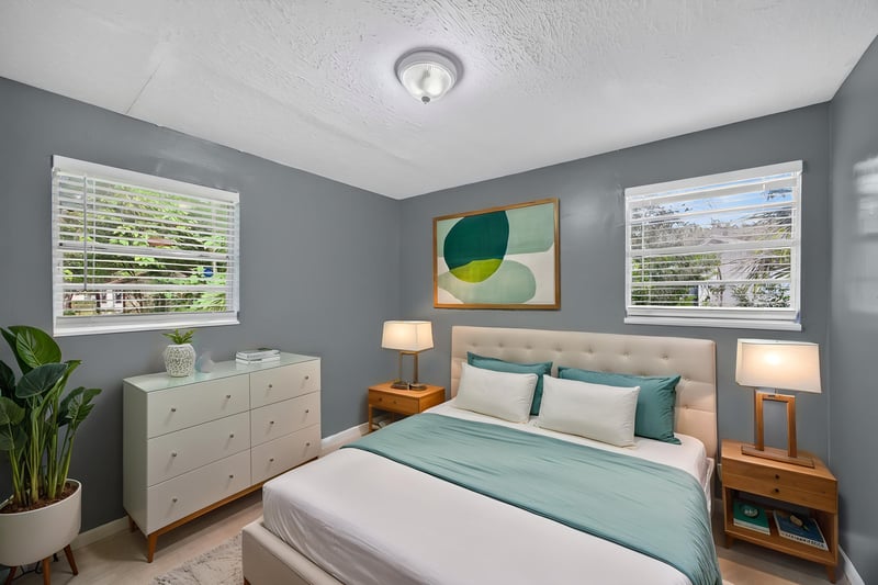 Bedroom virtually staged with bed and dresser at 6745 Jack Horner Ln, Jacksonville, FL 32210