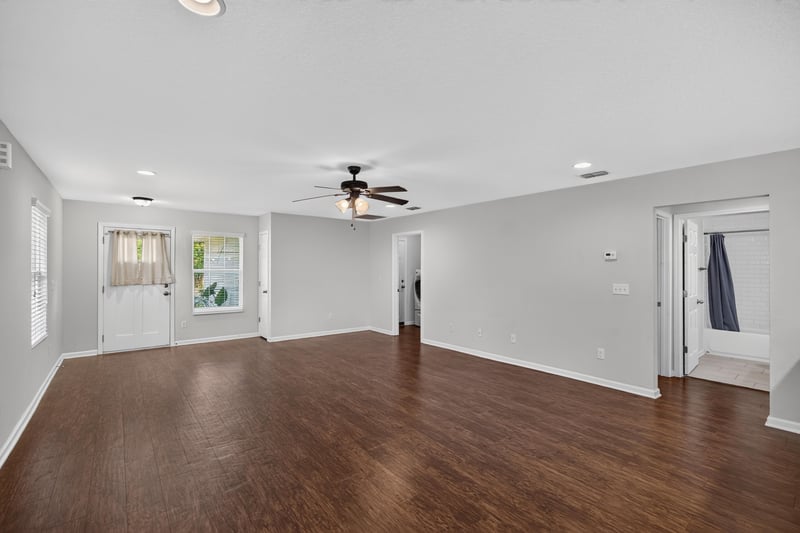 Empty room with wood floors and window at 1002 Ingleside Ave, Jacksonville, FL 32205