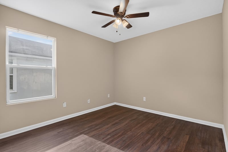 Primary bedroom, empty, large windows at 7253 Townsend Village Ct, Jacksonville, FL