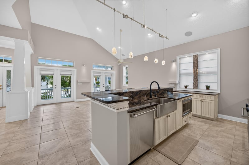 Kitchen island and sink area at 117 Island Cottage Way, St. Augustine, FL 32080