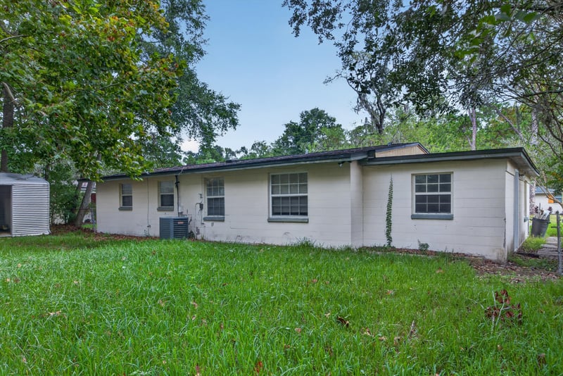 Rear exterior view of the home at 5812 Tampico Rd, Jacksonville, FL 32244