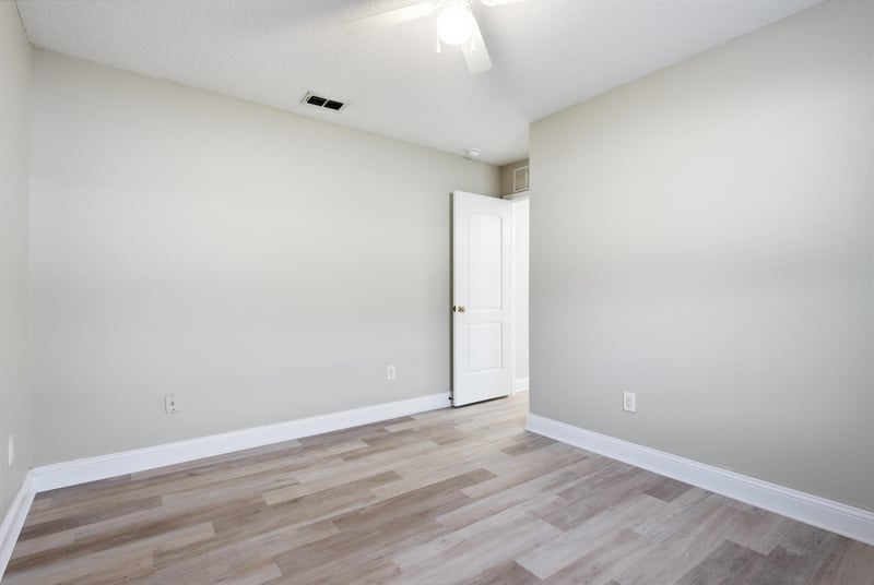 Room with vaulted ceiling and neutral paint at 14187 Big Spring St, Jacksonville, FL 32258