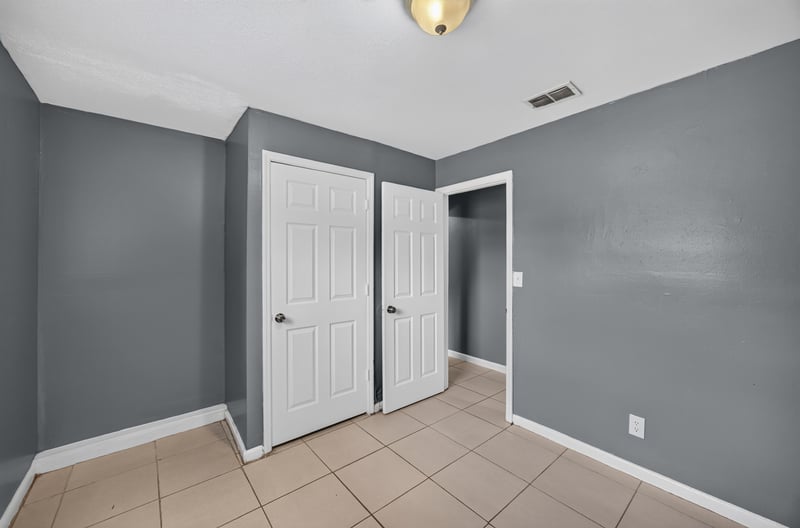 Hallway with closet doors at 6745 Jack Horner Ln, Jacksonville, FL 32210