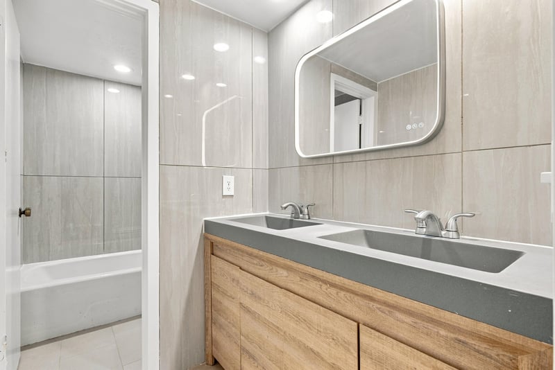 Bathroom vanity and tub at 7703 Las Palmas Way