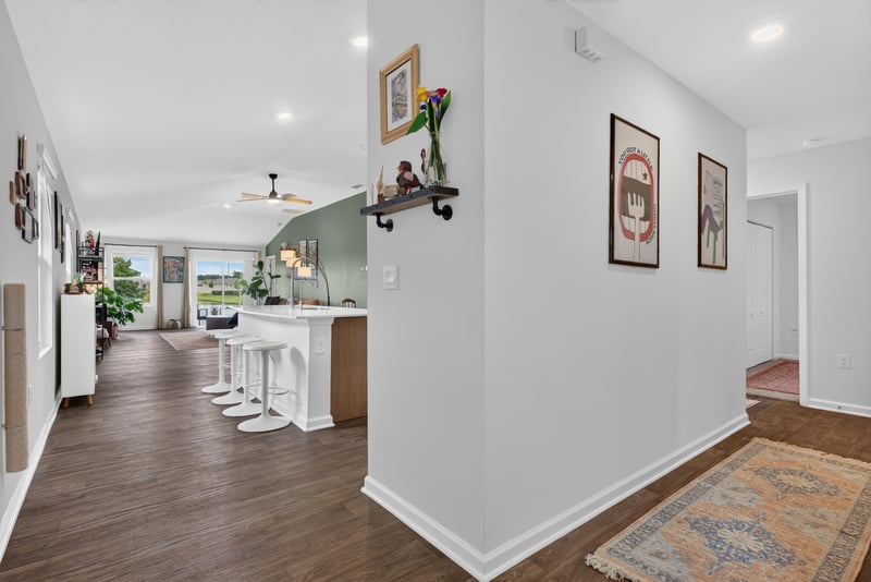 Open kitchen and living area with island at 4276 Quaking St, Jacksonville, FL 32218