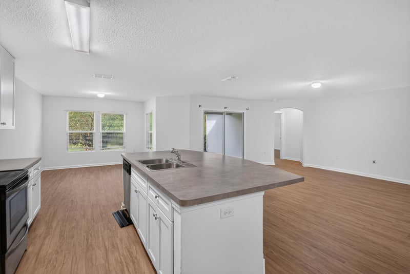 Kitchen island with open floor plan at 95221 Siena Ct, Fernandina Beach, FL 32034