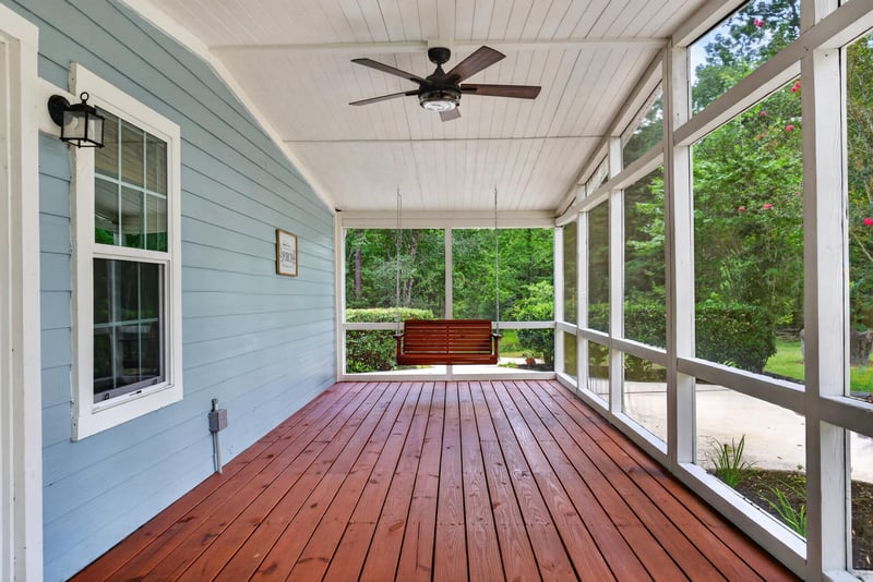 Screened porch with wood ceiling and ceiling fan at 4890 McAllister Rd, Middleburg, FL 32068