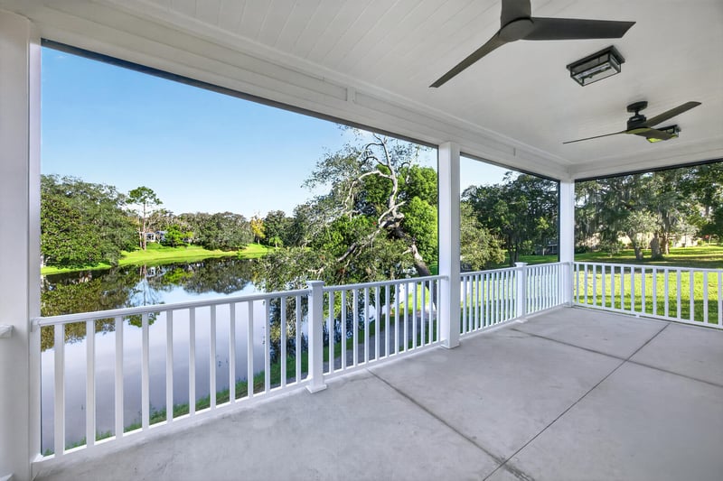 Covered back porch with pond view at 175 Alava Ct