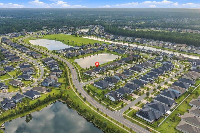 Overhead aerial marking the home's location within the neighborhood in Middleburg, FL