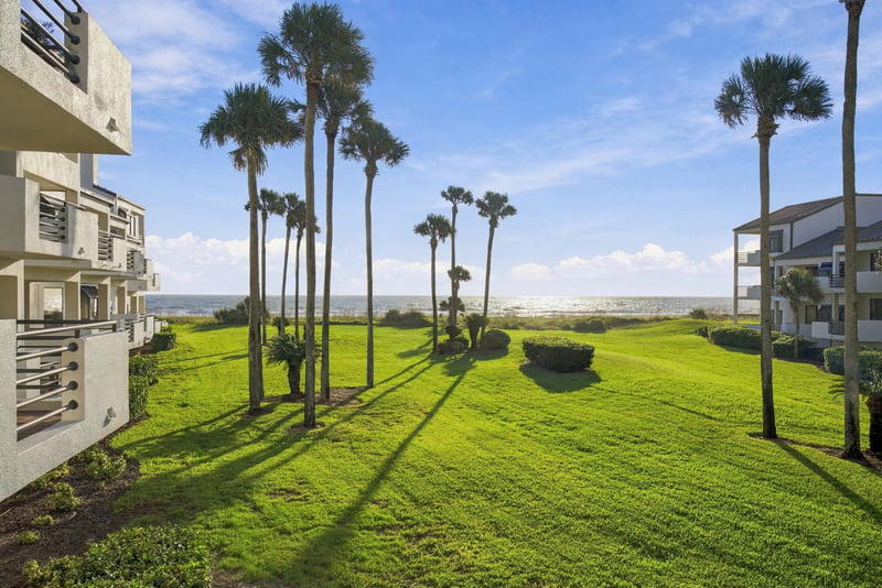 Condo building and palm trees panorama at 805 Spinnakers Reach Dr, Ponte Vedra Beach, FL 32082