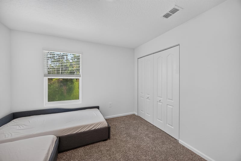 Window seat nook in upstairs room at 65255 Frst Glen Ln, Yulee, FL 32097