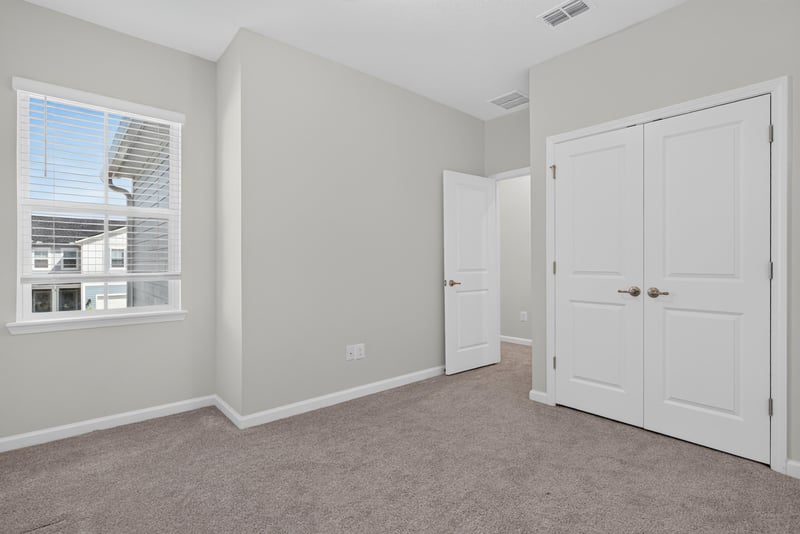 Bedroom with closet and window at 39 Mellowood Ln, St. Augustine, FL 32092