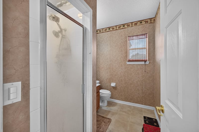 Bathroom with shower stall at 2875 Pebblewood Ln, Orange Park, FL 32065