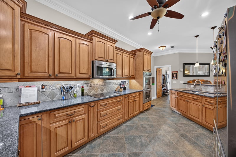 Kitchen with wood cabinets and stainless appliances at 1735 Hagans Ridge Ct