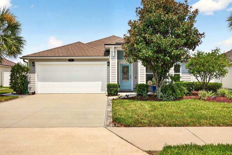 Front exterior angled view of driveway and garage at 85 Amia Dr, St. Augustine, FL 32086